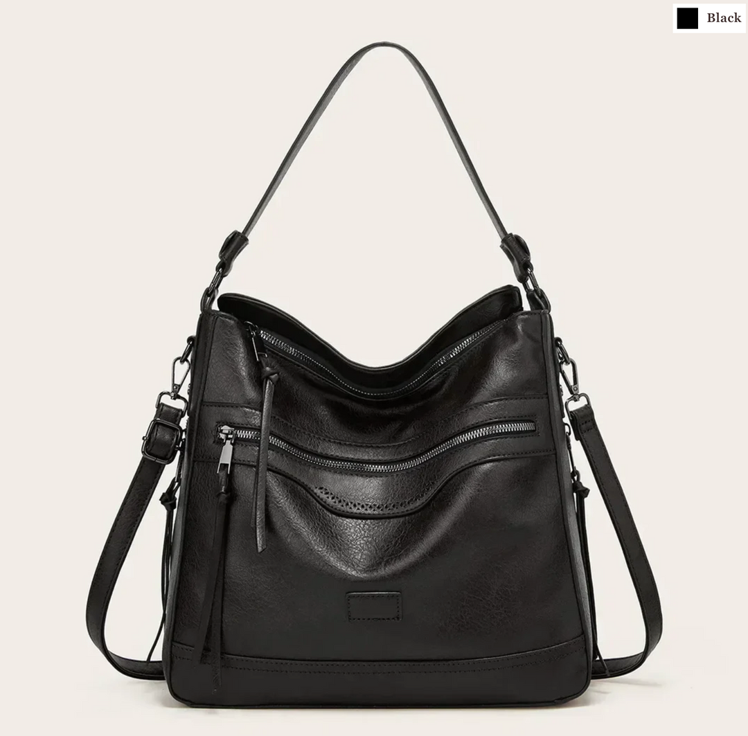 Malbjørg | Elegante Schultertasche mit wellenförmigem Design